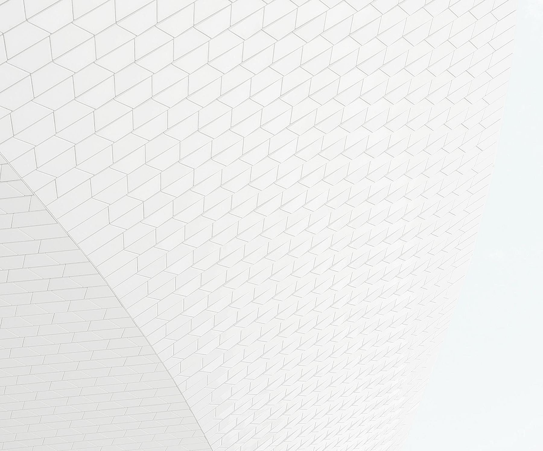 Textured white surface with geometric patterns.