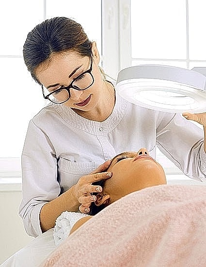 Beauty treatment session in a skincare clinic.